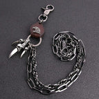 Brown cowhide eagle claw trousers chain gun black