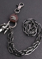 Brown cowhide eagle claw trousers chain gun black