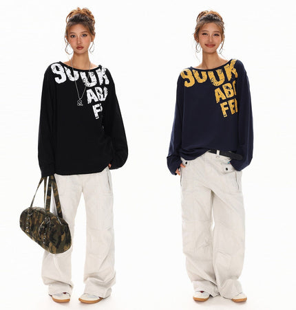 THETLSTUDIO Disruptive Lettering Off-Shoulder Top