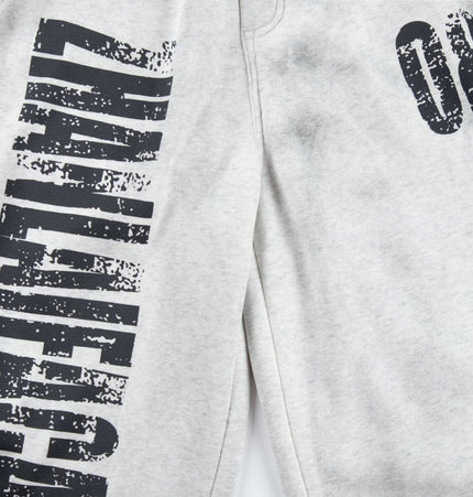 TALKLESSFASHION Fall 2025 American high street dirty and worn letter double waist sweatpants for men and women with a sense of design scimitar wide-leg pants