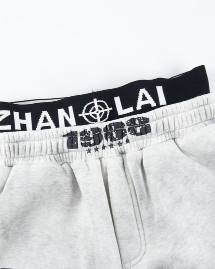 TALKLESSFASHION Fall 2025 American high street dirty and worn letter double waist sweatpants for men and women with a sense of design scimitar wide-leg pants