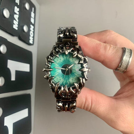TALKLESSFASHION Silver-black-green eyes Millennial special-shaped watches, mid-vintage, European and American style, high-end personality, creativity, niche design, carved tide men's watches