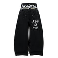 TALKLESSFASHION Trendy street letter graffiti patch leopard print fake two pieces of design scimitar wide-leg hip-hop jeans for men and women
