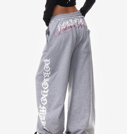THETLSTUDIO Vintage American Letter Print Scimitar Sweatpants Women's Trendy Sports Jazz Dance Street Loose Drape Wide-leg Pants